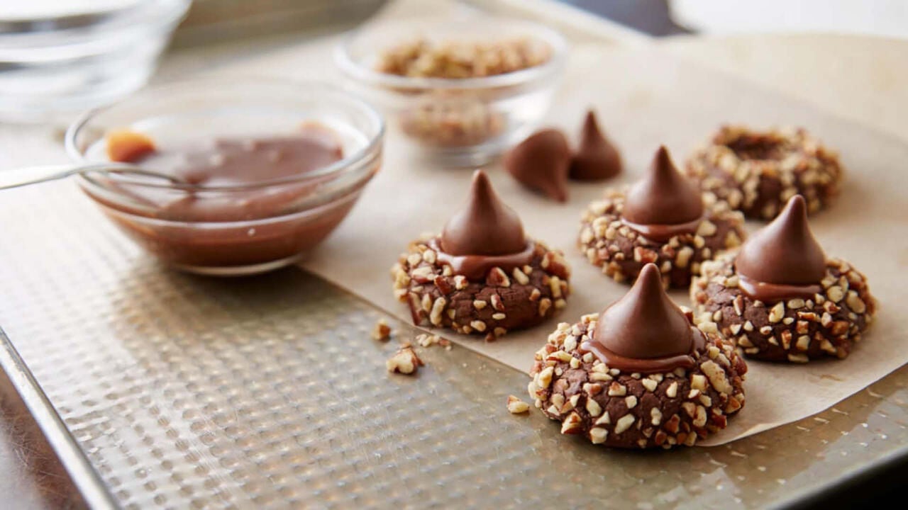fresh batch of hersheys kisses caramel thumbprint cookies