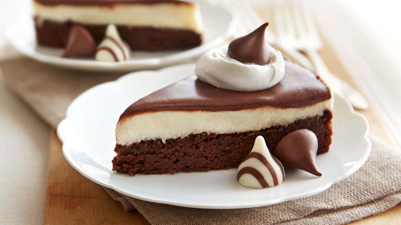 slice of tuxedo torte decorated with hersheys kisses