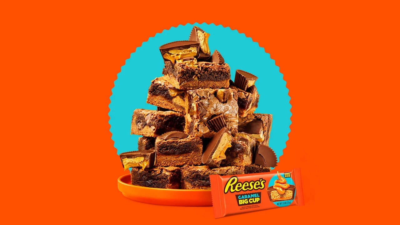 plate piled high with reeses caramel cup brownies