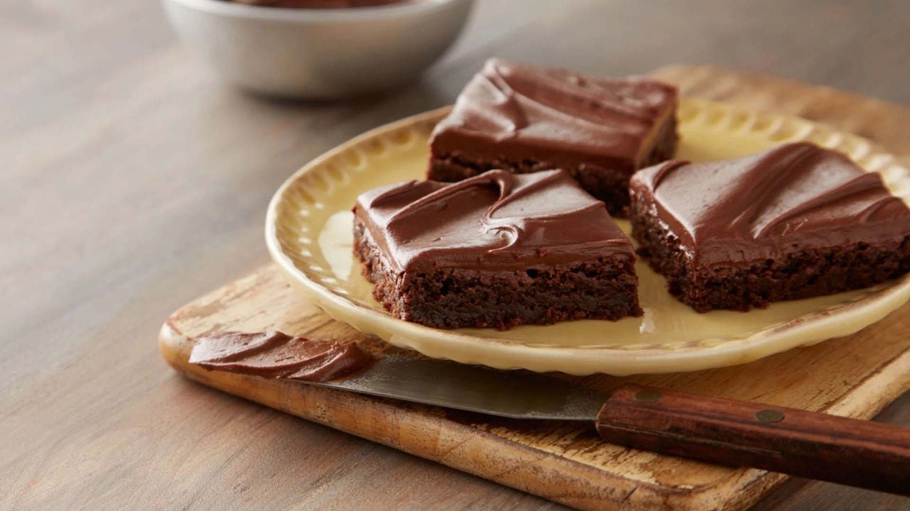 batch of hersheys best brownies topped with chocolate frosting