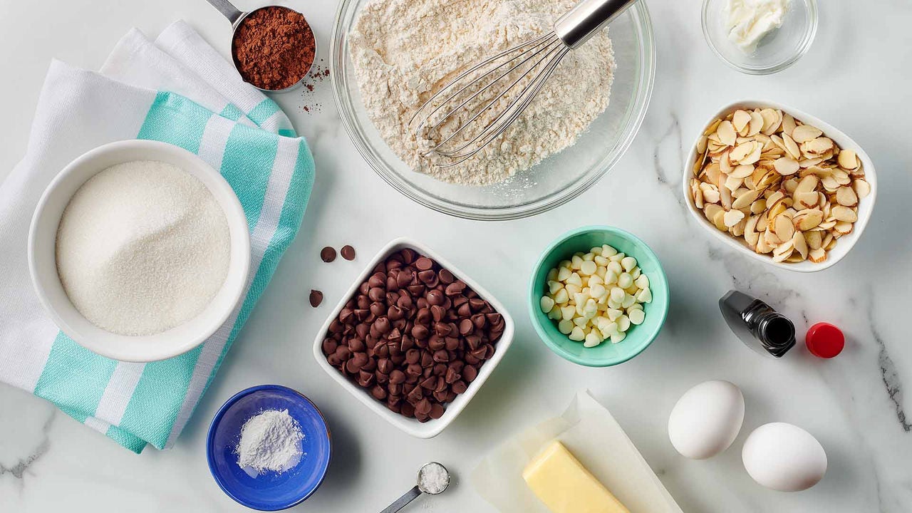 baking ingredients portioned out in individual bowls and spread over counter