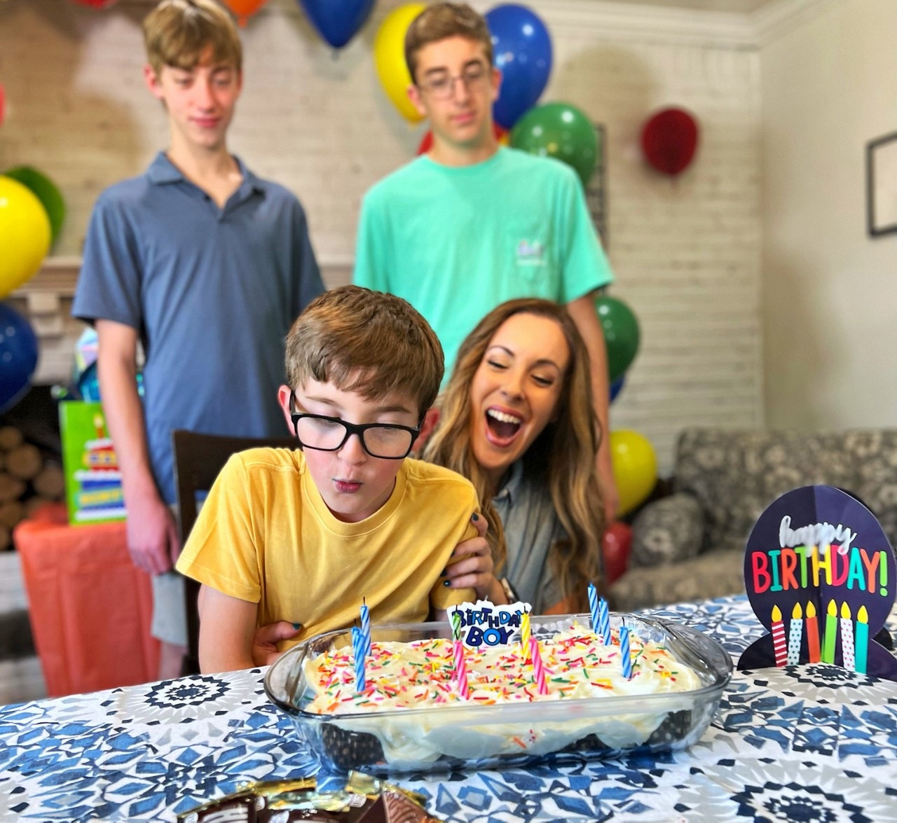 birthday bow blowing out candles