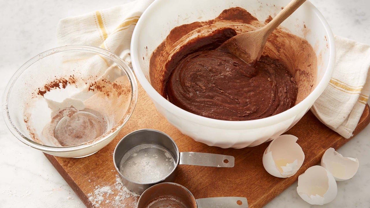 bowl of brownie batter and used sorting bowls for individual ingredients