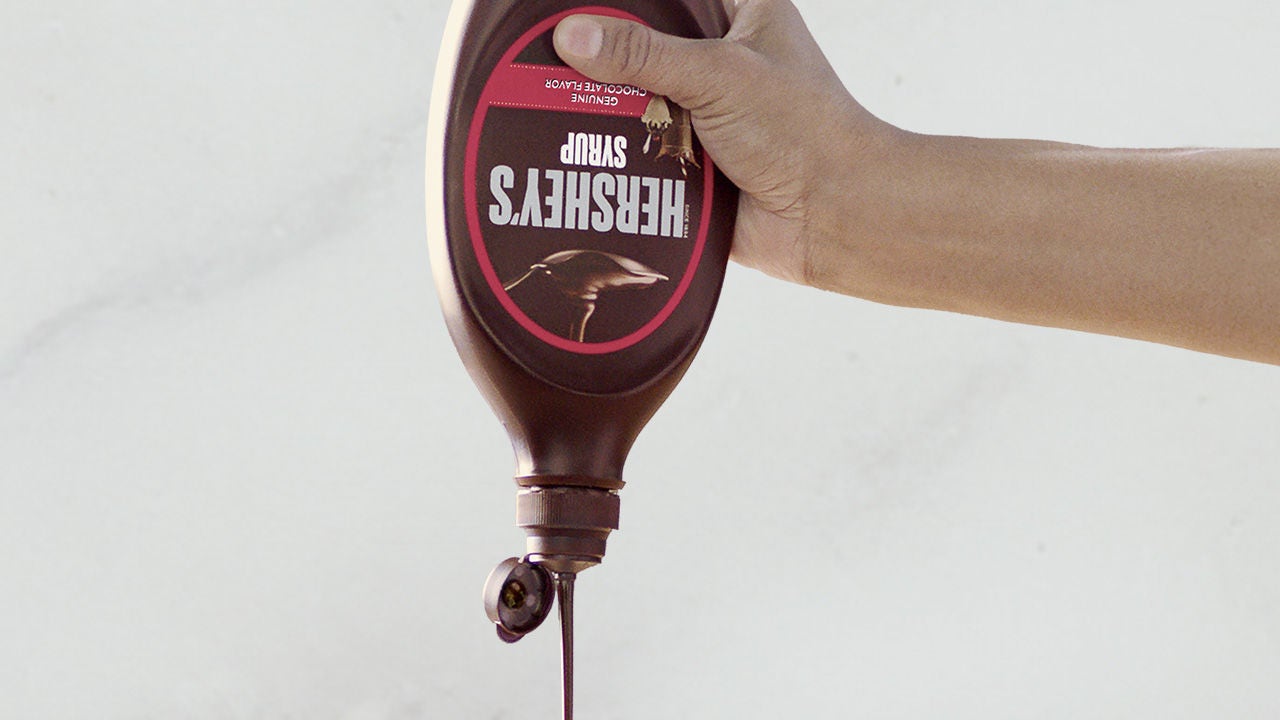 hersheys chocolate syrup being poured from bottle