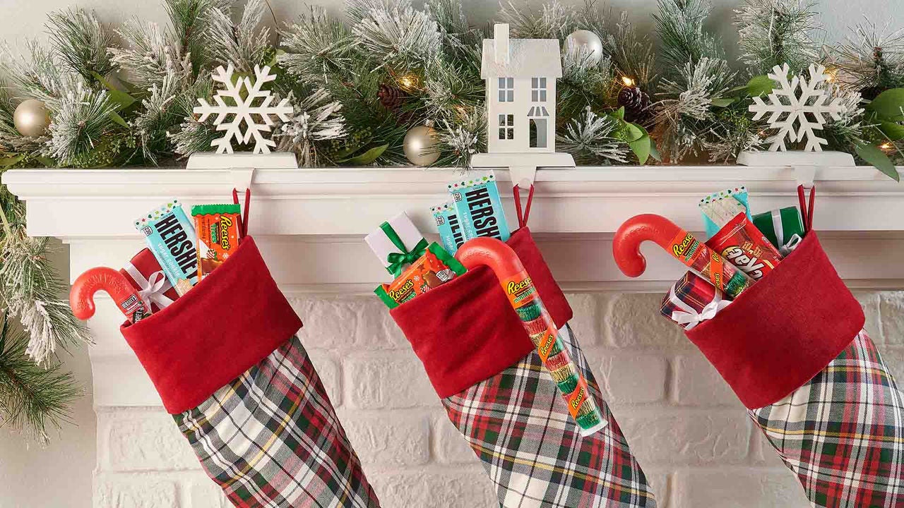 christmas stockings filled with assorted hersheys holiday candy