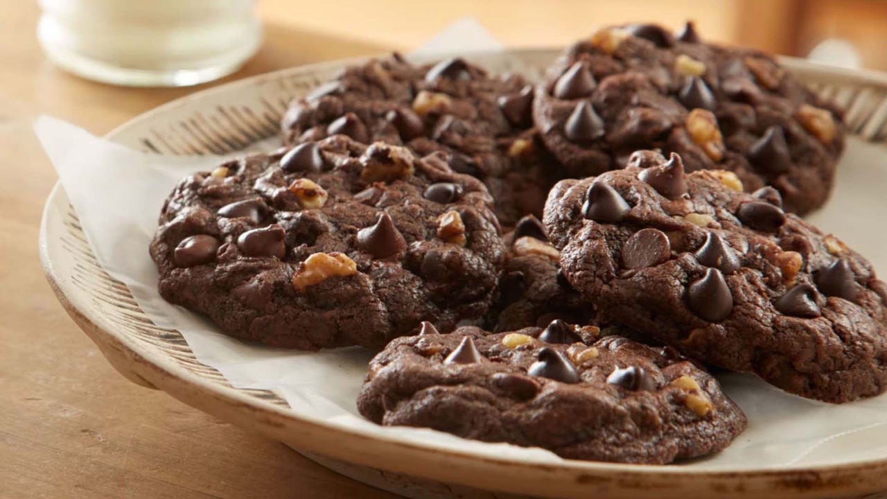 plate of freshly made hersheys doubly chocolate cookies