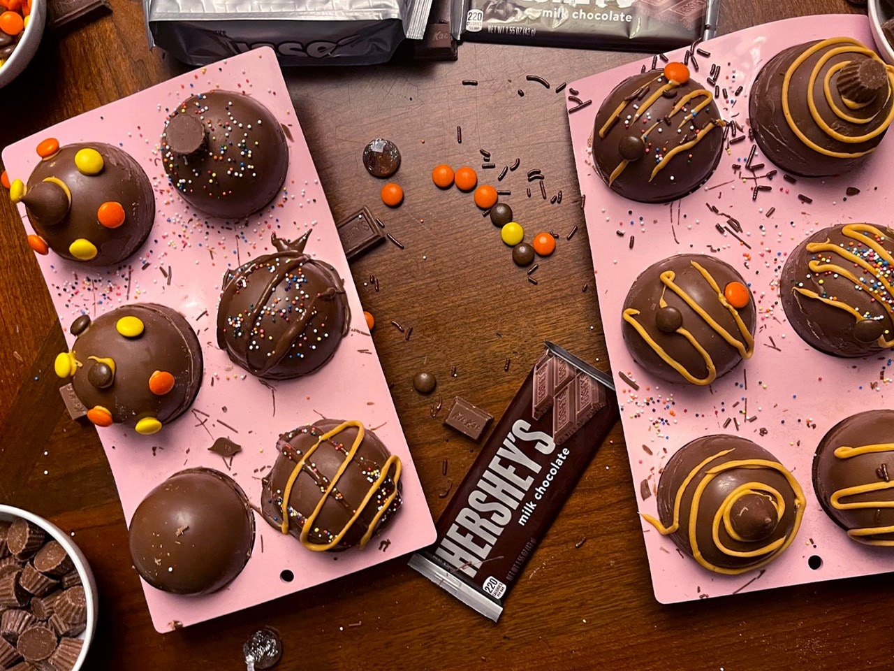 completed hot cocoa bomba in tray on table