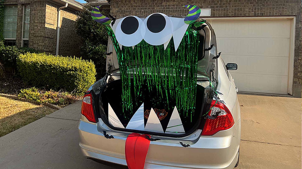 car trunk decorated to look like a monsters mouth