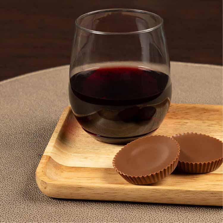 glass of red blend paired with reeses peanut butter cups