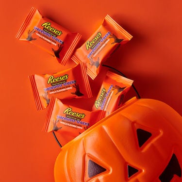 pumpkin bucket filled with reeses werewolf peanut butter cups