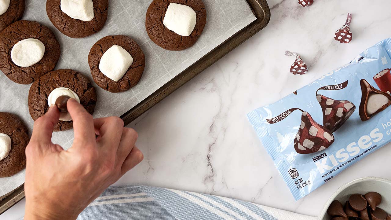 top cookies with hersheys hot cocoa kisses