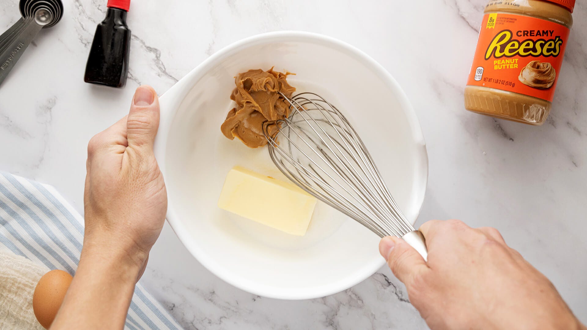 butter, sugar and peanut butter in a bowl