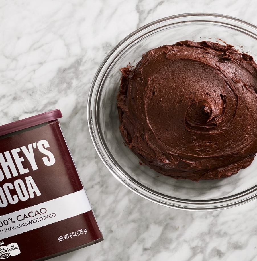 bowl of chocolate icing made with hersheys cocoa