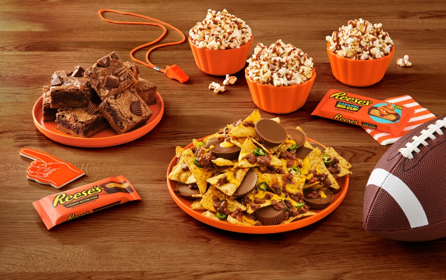 game day recipes made with reeses peanut butter cups surrounded by football decorations