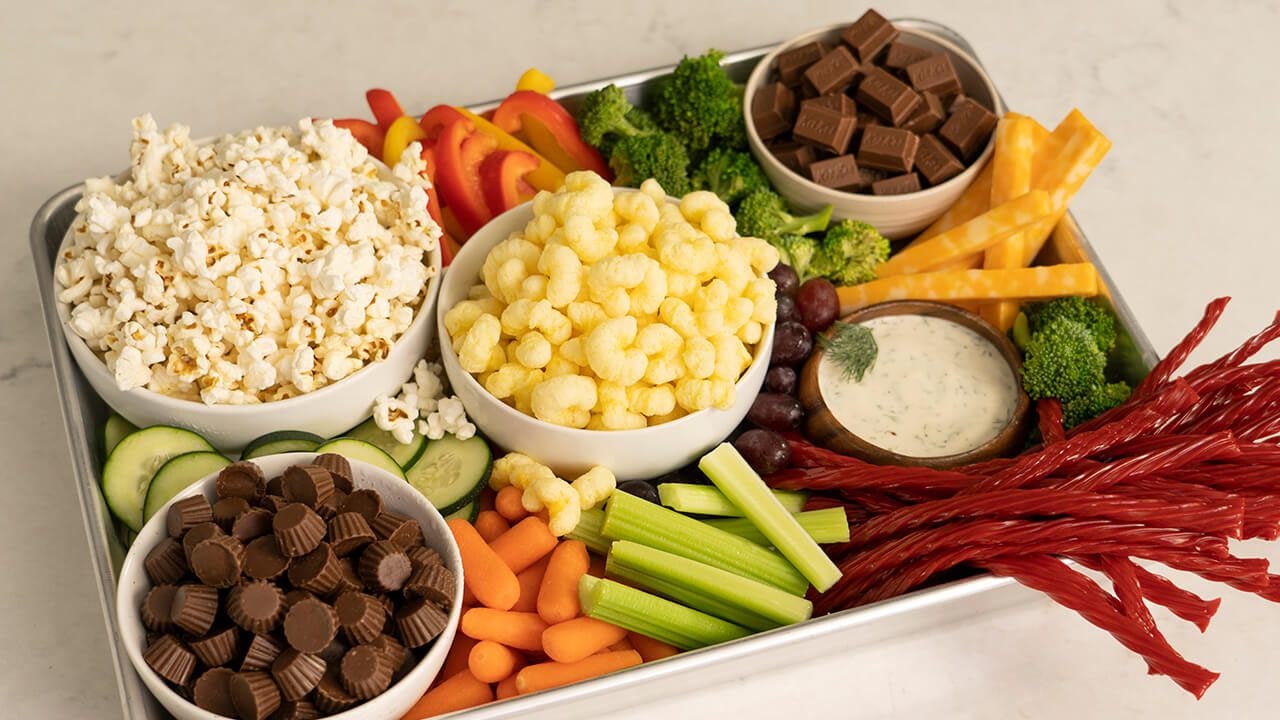 tray of assorted snacks and hersheys candy